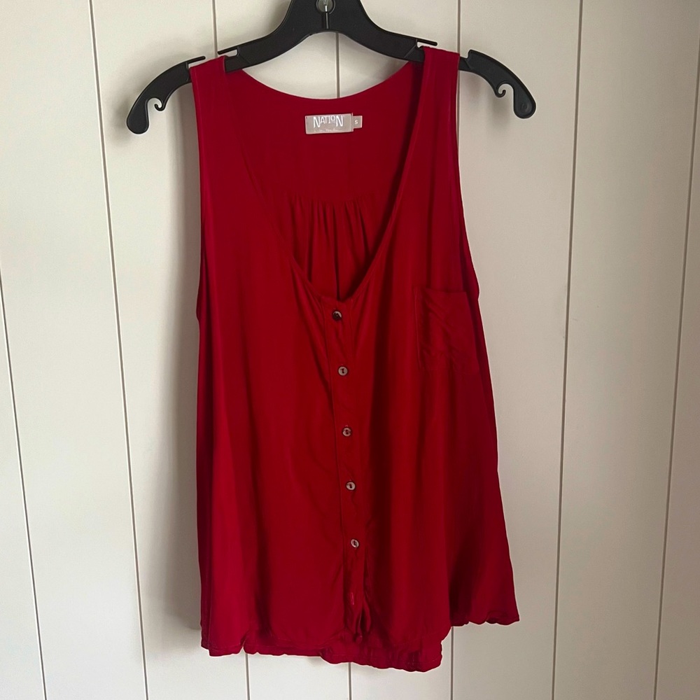 Nation Ltd. button swing tank